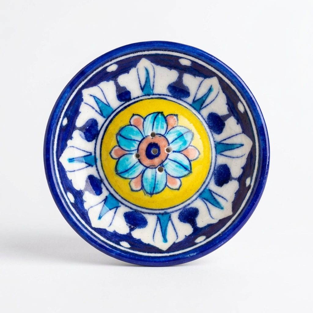 Handmade Blue Pottery incense holder on white background, full cobalt lotus and petal border motif