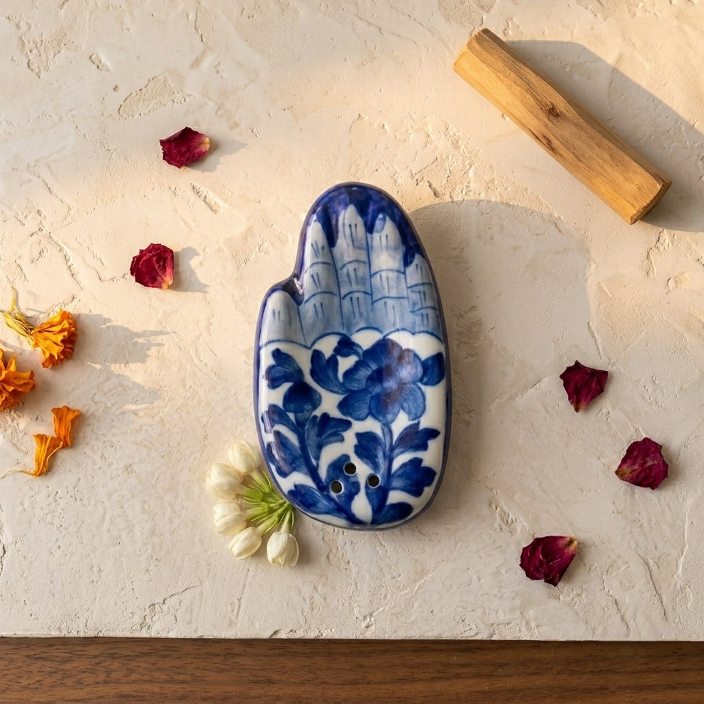 Blue Pottery Hamsa incense stand with white botanical vine motif, artisan luxury home and puja décor