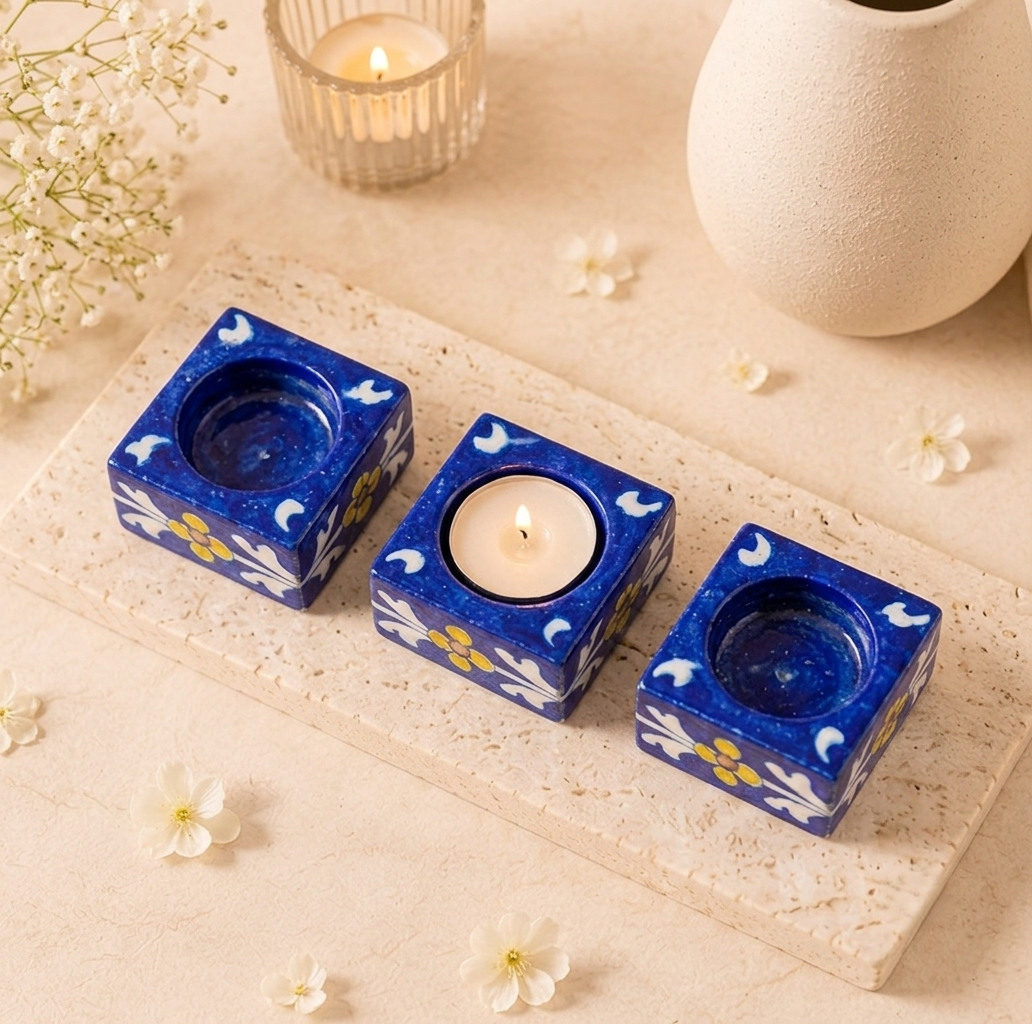 Set of three handcrafted Jaipur Blue Pottery candle holders with floral patterns for Diwali décor and elegant table styling
