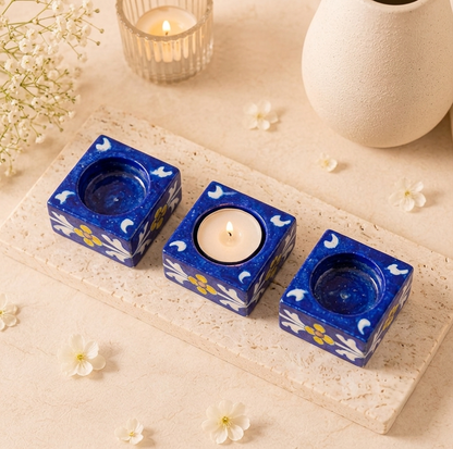 Set of three handcrafted Jaipur Blue Pottery candle holders with floral patterns for Diwali décor and elegant table styling